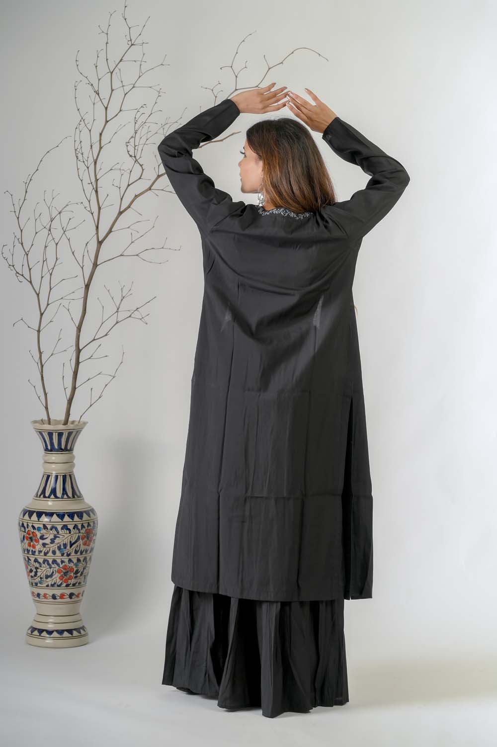 Black Silk Lehenga set for weddings with Silver Zari Jacket - Back View | Oopnik